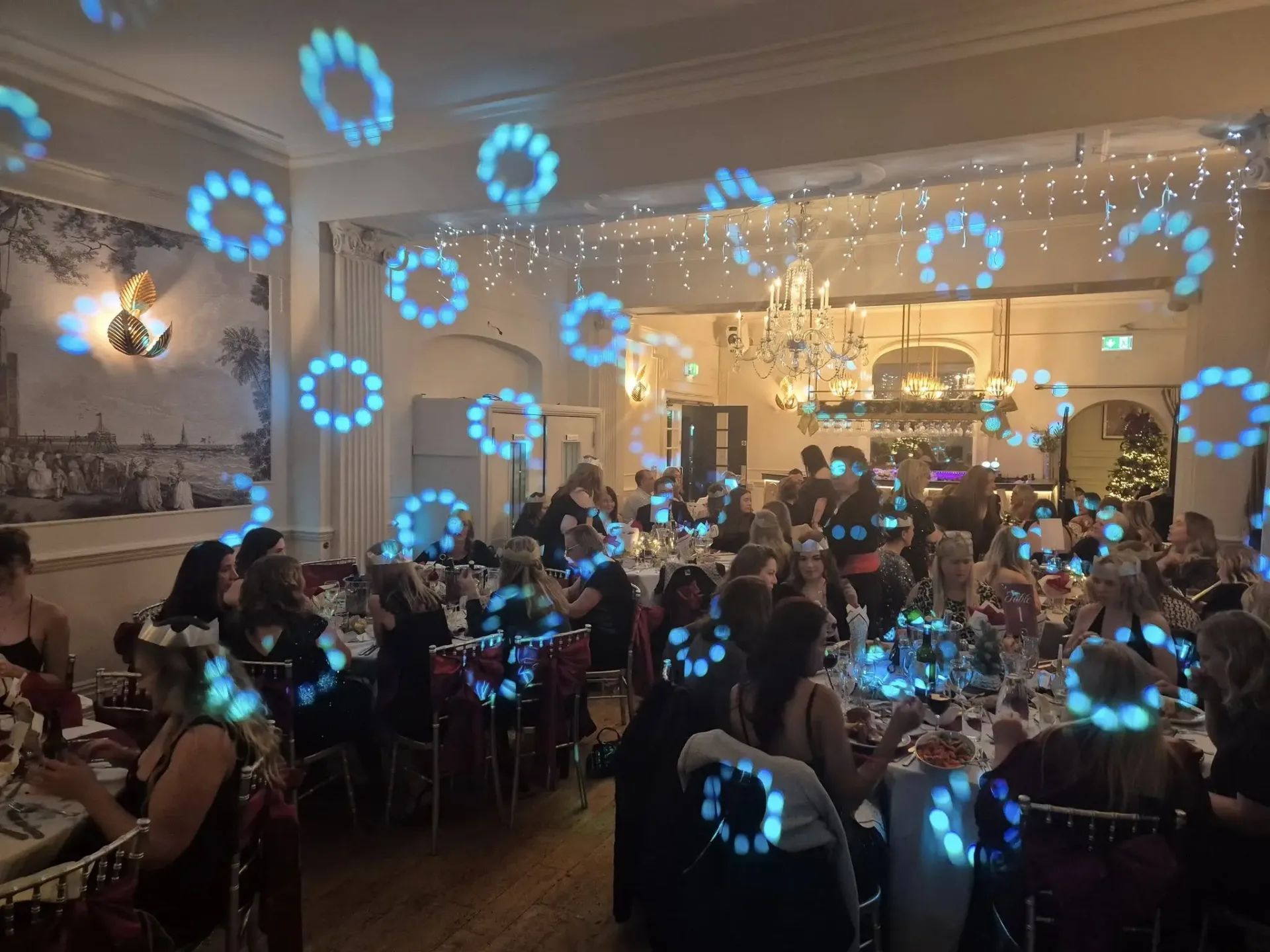 Christmas party dinner with blue gobo lighting
